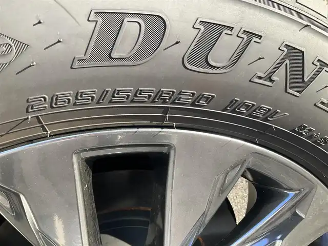 トヨタ ランドクルーザー ZX 滋賀県 2025(令7)年 0.1千km プレシャスホワイトパール ワンオーナー/車検10年9月まで/モデリスタエアロ（フロント、サイド、リア）/3列シート7人乗り/ブラックルーフレール/クールボックス/トノカバー/ムーンルーフ/タイヤ空気圧警報システム/トヨタセーフティセンス/ブラインドスポットモニター/レーダークルーズコントロール/12.3インチディスプレイオーディオプラス/フルセグテレビ、AppleCarPlay、AndroidAuto/JBLプレミアムサウンドシステム/後席11.6インチリアシートエンターテインメント/パノラミックビューモニター/ビルトインETC2.0/ベージュ革シート/前席パワーシート/前席、2列目ベンチレーション付き快適温熱シート/スペアキー有り/取扱説明書、保証書/