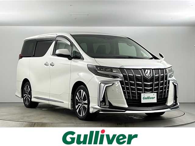 トヨタ アルファード S Cパッケージ 愛知県 2020(令2)年 5万km ホワイトパールクリスタルシャイン モデリスタエアロ（フロント/サイド/リア）/純正8型ナビ/（CD/DVD/Bluetooth/フルセグTV）/フリップダウンモニター/バックカメラ/ビルトインETC/トヨタセーフティーセンス/横滑り防止装置/レーンキープアシスト/衝突軽減システム/カーテンエアバッグ/コーナーセンサー（前後）/アダクティブクルーズコントロール/ブラインドスポットモニター/デジタルインナーミラー/黒レザーシート/全席パワーシート（2列目まで）/シートヒーター（D/N席）/エアシート（D/N席）/両側パワースライドドア/パワーバックドア/ステアリングヒーター/LEDヘッドライト/オートライト/オートマチックハイビーム/前方ドライブレコーダー/ウォークスルー/純正18インチアルミホイール/純正フロアマット/スマートキー/前方ドライブレコーダー/禁煙車