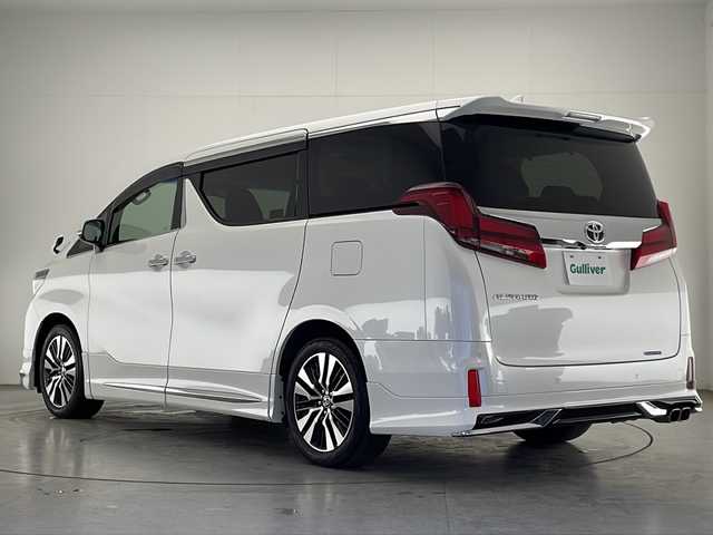 トヨタ アルファード S Cパッケージ 宮崎県 2020(令2)年 5万km ホワイトパールクリスタルシャイン モデリスタエアロ（フロント/サイド/リア）/純正8型ナビ/（CD/DVD/Bluetooth/フルセグTV）/フリップダウンモニター/バックカメラ/ビルトインETC/トヨタセーフティーセンス/横滑り防止装置/レーンキープアシスト/衝突軽減システム/カーテンエアバッグ/コーナーセンサー（前後）/アダクティブクルーズコントロール/ブラインドスポットモニター/デジタルインナーミラー/黒レザーシート/全席パワーシート（2列目まで）/シートヒーター（D/N席）/エアシート（D/N席）/両側パワースライドドア/パワーバックドア/ステアリングヒーター/LEDヘッドライト/オートライト/オートマチックハイビーム/前方ドライブレコーダー/ウォークスルー/純正18インチアルミホイール/純正フロアマット/スマートキー/前方ドライブレコーダー/禁煙車