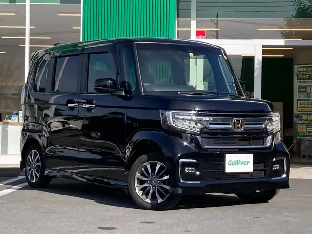 ホンダ Ｎ ＢＯＸ カスタム EX 静岡県 2021(令3)年 2.1万km クリスタルブラックパール 純正ナビ(VXM-215Ci)/CD/Bluetooth/SD/バックカメラ/シートヒーター/助手席ロングスライド/USBポート２口/ETC/レーダークルーズコントロール/スペアキー/ステアリングリモコン/両側パワースライドドア/衝突軽減ブレーキ/レーンキープアシスト/オートライト/LEDライト/リアソナー/後席サンシェイド/光軸レベライザー/電動格納ミラー/純正フロアマット/サイドバイザー/純正アルミホイール