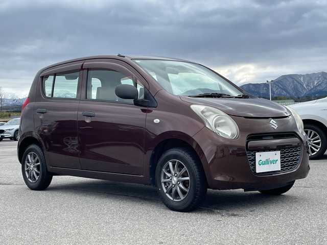 スズキ アルト F 富山県 2011(平23)年 10.6万km マルーンブラウンパール 社外メモリナビ/【CD/FM/AM/AUX/ワンセグTV】/バックカメラ/純正フロアマット/社外13インチアルミホイール/ハロゲンヘッドライト/保証書・記録簿/取扱説明書/リモコンキー×１