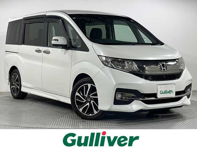ホンダ ステップワゴン スパーダ クールスピリット 広島県 2016(平28)年 5.1万km ホワイトオーキッドパール 純正ナビ/純正フリップダウンモニター/全周囲カメラ/両側パワースライドドア/シートヒーター/レーダークルコン/衝突軽減ブレーキ/パーキングアシスト/ＬＥＤヘッドランプ/フルセグＴＶ/ＥＴＣ/ＵＳＢ