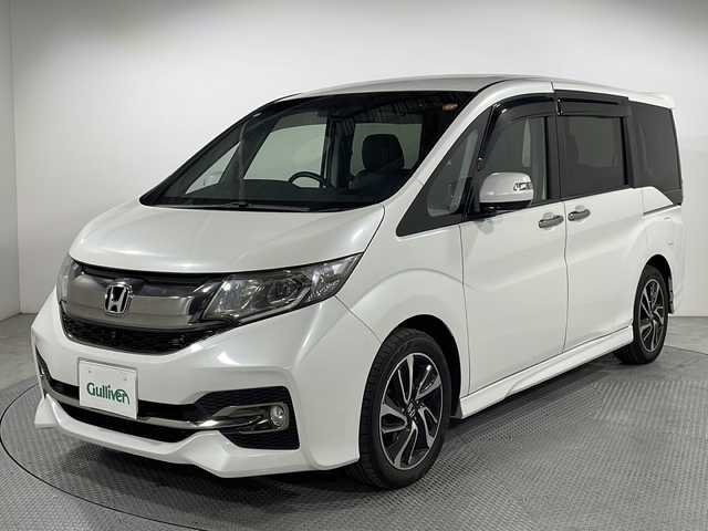 ホンダ ステップワゴン スパーダ クールスピリット 広島県 2016(平28)年 5.1万km ホワイトオーキッドパール 純正ナビ/純正フリップダウンモニター/全周囲カメラ/両側パワースライドドア/シートヒーター/レーダークルコン/衝突軽減ブレーキ/パーキングアシスト/ＬＥＤヘッドランプ/フルセグＴＶ/ＥＴＣ/ＵＳＢ