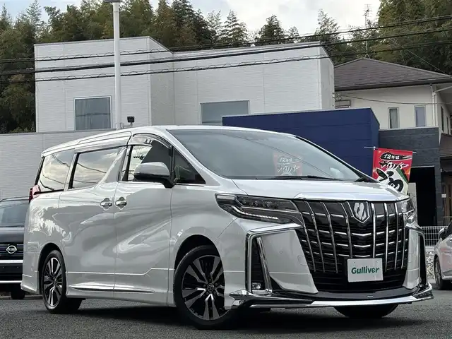 トヨタ アルファード S Cパッケージ 熊本県 2020(令2)年 4.9万km ホワイトパールクリスタルシャイン モデリスタエアロ/サンルーフ/純正ディスプレイオーディオナビ機能付き/【フルセグTV/Bluetooth再生/DVDデッキ】/バックカメラ/純正フリップダウンモニター/レーダークルーズコントロール/プリクラッシュセーフティ/レーントレーシングアシスト/クリアランスソナー/ロードサインアシスト/パーキングサホートブレーキ/純正18インチAW/オートハイビーム/LEDオートライト/フォグライト/ビルトインETC/ドライブレコーダー（F.R）/ビルトインETC/取扱説明書/保証書