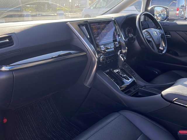トヨタ アルファード S Cパッケージ 山口県 2019(令1)年 7.2万km ホワイトパールクリスタルシャイン 社外１１型ナビ（FM/AM/フルセグTV）/Bluetooth/バックカメラ/12列目サンルーフ/TRDフルエアロ/前席シートヒーター＆ベンチレーション/ステアリングヒーター/12列目パワーシート/革シート/助手席＆後席オットマン/ドライブレコーダー（前）/両側パワースライドドア/電動リヤゲート/MTモード付AT/純正フロアマット/W＋サイドエアバック/カーテンエアバック/前後コーナーセンサー/LEDヘッドライト/ETC/トヨタセーフティーセンス/・プリクラッシュセーフティ/・レーントレーシングアシスト/・レーンコントロール/・アダプティブハイビームシステム/・オートマチックハイビーム/・ロードサインアシスト/・リヤクロストラフィックオートブレーキ/・インテリジェントクリアランスソナー/純正１８インチアルミホイール