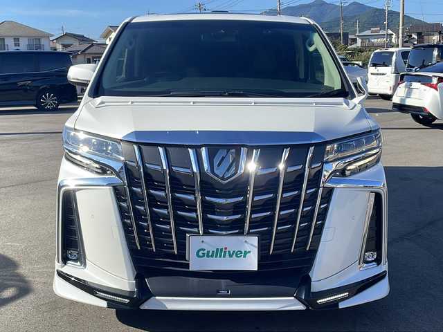 トヨタ アルファード S Cパッケージ 山口県 2019(令1)年 7.2万km ホワイトパールクリスタルシャイン 社外１１型ナビ（FM/AM/フルセグTV）/Bluetooth/バックカメラ/12列目サンルーフ/TRDフルエアロ/前席シートヒーター＆ベンチレーション/ステアリングヒーター/12列目パワーシート/革シート/助手席＆後席オットマン/ドライブレコーダー（前）/両側パワースライドドア/電動リヤゲート/MTモード付AT/純正フロアマット/W＋サイドエアバック/カーテンエアバック/前後コーナーセンサー/LEDヘッドライト/ETC/トヨタセーフティーセンス/・プリクラッシュセーフティ/・レーントレーシングアシスト/・レーンコントロール/・アダプティブハイビームシステム/・オートマチックハイビーム/・ロードサインアシスト/・リヤクロストラフィックオートブレーキ/・インテリジェントクリアランスソナー/純正１８インチアルミホイール