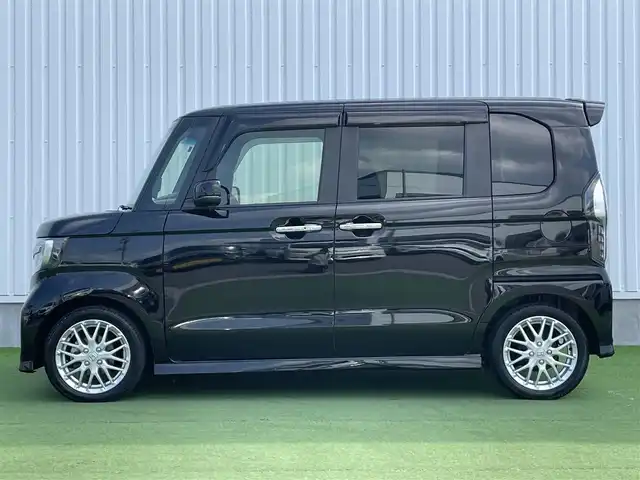 ホンダ Ｎ ＢＯＸ カスタム L ターボ 香川県 2021(令3)年 4.9万km クリスタルブラックパール 登録時走行距離；48629km/社外ナビ/バックカメラ/ETC/ドライブレコーダー/両側パワースライドドア/衝突被害軽減システム/レーンキープアシスト/クルーズコントロール/クリアランスソナー/パドルシフト/LEDヘッドライト/純正フロアマット/純正AW15インチ/革巻きステアリング/ステアリングスイッチ/シートヒーター/スマートキー