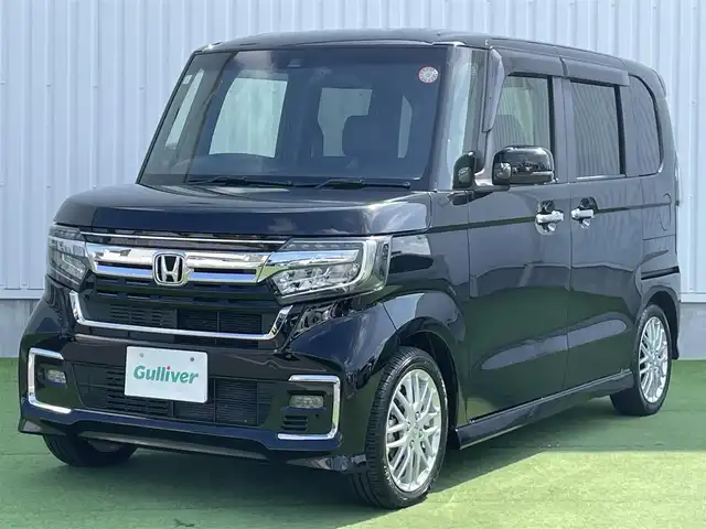 ホンダ Ｎ ＢＯＸ カスタム L ターボ 香川県 2021(令3)年 4.9万km クリスタルブラックパール 登録時走行距離；48629km/社外ナビ/バックカメラ/ETC/ドライブレコーダー/両側パワースライドドア/衝突被害軽減システム/レーンキープアシスト/クルーズコントロール/クリアランスソナー/パドルシフト/LEDヘッドライト/純正フロアマット/純正AW15インチ/革巻きステアリング/ステアリングスイッチ/シートヒーター/スマートキー