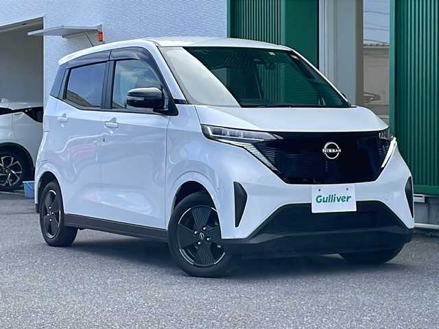 日産 サクラ X 岐阜県 2023(令5)年 1.6万km ホワイトパール 禁煙車/純正9型ナビ/AM/FM/CD/DVD/SD/BT/MSV/フルセグ/アラウンドビューモニタ/エマージェンシーブレーキ /セーフティーシールド /E-Pedal/電子パーキングブレーキ/ブレーキホールド/AAC/社外前後ドライブレコーダー/ETC/ステアリングスイッチ/オートライト/オートハイビーム/LEDヘッドライト/スペアキー/スマートキー/プッシュスタート /純正アルミホイール