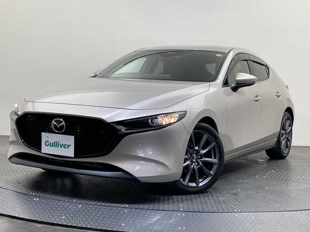 マツダ マツダ３ファストバック 15S ツーリング 愛媛県 2024(令6)年 0.4万km プラチナクォーツメタリック 純正ナビ/(Bluetooth/フルセグ/HDMI/USB)/全周囲カメラ/レーダークルーズコントロール/衝突被害軽減ブレーキ/レーンキープアシスト/前後コーナーセンサー/前後ドライブレコーダー/ブラインドスポットモニター/ETC/純正18インチアルミ/電動格納ミラー/プッシュスタート/保証書/取扱説明書