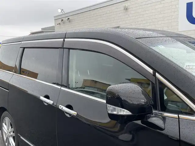 日産 エルグランド 250ハイウェイスター 佐賀県 2011(平23)年 10.9万km ファントムブラック (株)IDOMが運営する【じしゃロン佐賀店】の自社ローン対象車両になります。こちらは現金ご利用時の価格です。自社ローンご希望の方は別途その旨お申付け下さい。/７人乗　/ブラック　/フリップダウンモニター　/純正ＨＤＤナビ フルセグ 全周囲カメラ　/ＢＴオーディオ ＤＶＤ ＣＤ