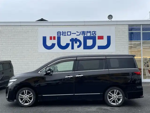 日産 エルグランド 250ハイウェイスター 佐賀県 2011(平23)年 10.9万km ファントムブラック (株)IDOMが運営する【じしゃロン佐賀店】の自社ローン対象車両になります。こちらは現金ご利用時の価格です。自社ローンご希望の方は別途その旨お申付け下さい。/７人乗　/ブラック　/フリップダウンモニター　/純正ＨＤＤナビ フルセグ 全周囲カメラ　/ＢＴオーディオ ＤＶＤ ＣＤ