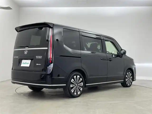 ホンダ ステップワゴン スパーダ eHEV プレミアムライン 埼玉県 2024(令6)年 3.5万km クリスタルブラックパール ワンオーナー/純正１１．４型メモリナビ/(CD/DVD/Bluetooth/HDMI/USB/音楽録音/フルセグ)/ホンダセンシング/マルチビューカメラ/アダプティブクルーズコントロール/両側パワースライドドア/前後ドライブレコーダー/ビルトインＥＴC/パワーバックドア/ハーフレザーシート/オットマン/シートヒーター/オートＬＥＤライト/オートブレーキホールド