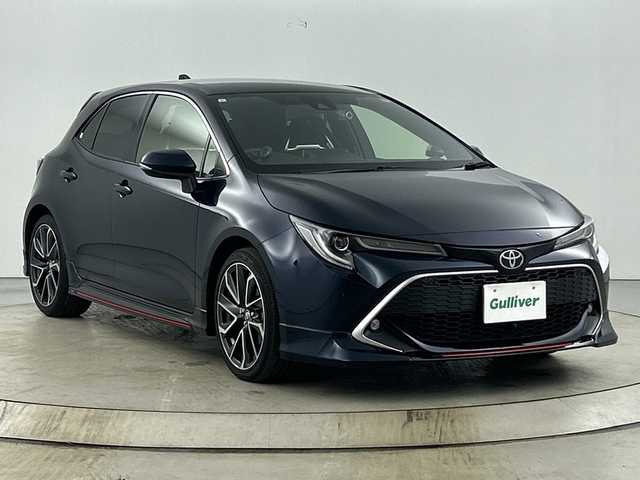 トヨタ カローラ スポーツ G Z 愛知県 2019(平31)年 4.9万km ブラッキッシュアゲハガラスフレーク 禁煙車/純正9インチナビ/（CD/DVD/Bluetooth/フルセグTV/USB/HDMI)/バックカメラ/TRDフルエアロ/プレミアムサウンド8chスピーカー/トヨタセーフティセンス/・プリクラッシュセーフティ/・レーントレーシングアシスト/・オートマチックハイビーム/・レーダークルーズコントロール/・リヤクロストラフィックアラート/・パーキングサポートブレーキ/・クリアランスソナー/・ブラインドスポットモニター/ヘッドアップディスプレイ/デジタルインナーミラー/ドライブレコーダー/ETC2.0/純正18インチアルミホイール/スマートキー/スペアキー1本/プッシュスタート/LEDヘッドライト/フロントフォグランプ/オートライト/純正フロアマット/横滑り防止装置/ステアリングスイッチ/電動格納ミラー