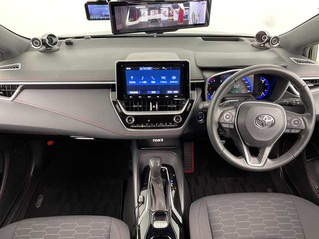 トヨタ カローラ スポーツ G Z 愛知県 2019(平31)年 4.9万km ブラッキッシュアゲハガラスフレーク 禁煙車/純正9インチナビ/（CD/DVD/Bluetooth/フルセグTV/USB/HDMI)/バックカメラ/TRDフルエアロ/プレミアムサウンド8chスピーカー/トヨタセーフティセンス/・プリクラッシュセーフティ/・レーントレーシングアシスト/・オートマチックハイビーム/・レーダークルーズコントロール/・リヤクロストラフィックアラート/・パーキングサポートブレーキ/・クリアランスソナー/・ブラインドスポットモニター/ヘッドアップディスプレイ/デジタルインナーミラー/ドライブレコーダー/ETC2.0/純正18インチアルミホイール/スマートキー/スペアキー1本/プッシュスタート/LEDヘッドライト/フロントフォグランプ/オートライト/純正フロアマット/横滑り防止装置/ステアリングスイッチ/電動格納ミラー