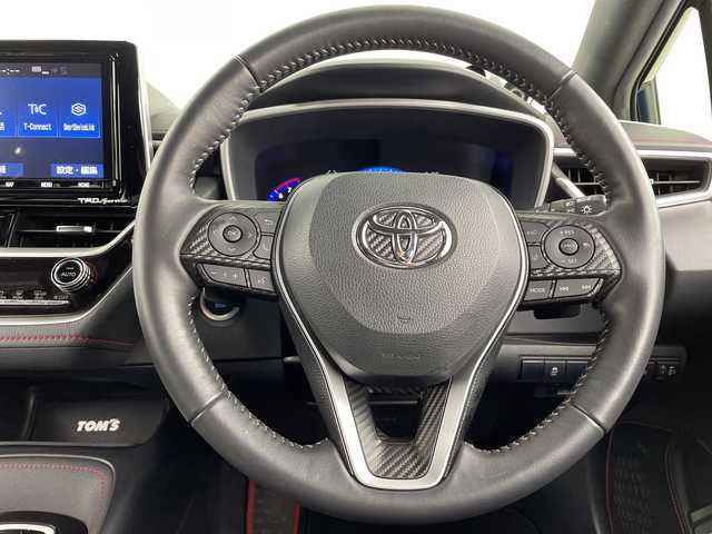 トヨタ カローラ スポーツ G Z 愛知県 2019(平31)年 4.9万km ブラッキッシュアゲハガラスフレーク 禁煙車/純正9インチナビ/（CD/DVD/Bluetooth/フルセグTV/USB/HDMI)/バックカメラ/TRDフルエアロ/プレミアムサウンド8chスピーカー/トヨタセーフティセンス/・プリクラッシュセーフティ/・レーントレーシングアシスト/・オートマチックハイビーム/・レーダークルーズコントロール/・リヤクロストラフィックアラート/・パーキングサポートブレーキ/・クリアランスソナー/・ブラインドスポットモニター/ヘッドアップディスプレイ/デジタルインナーミラー/ドライブレコーダー/ETC2.0/純正18インチアルミホイール/スマートキー/スペアキー1本/プッシュスタート/LEDヘッドライト/フロントフォグランプ/オートライト/純正フロアマット/横滑り防止装置/ステアリングスイッチ/電動格納ミラー