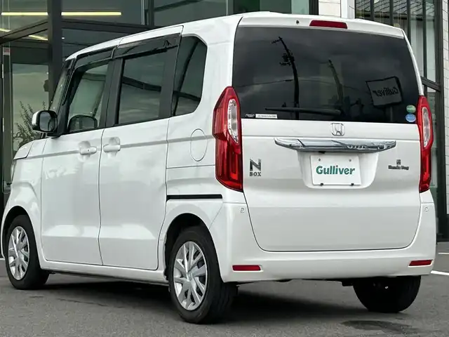 ホンダ Ｎ ＢＯＸ G L ターボ ホンダセンシング 愛媛県 2019(令1)年 4.3万km プラチナホワイトパール 純正ナビ（Bluetooth/メモリ/フルセグテレビ）/ETC/ホンダセンシング/前後ドライブレコーダー/両側電動スライドドア/シートヒーター/パドルシフト/ベンチシート/チップアップシート/社外フロアマット/カーテンエアバック/LEDオートヘッドライト