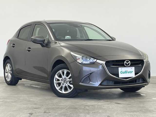 マツダ デミオ 13S ツーリング 群馬県 2016(平28)年 3.7万km チタニウムフラッシュマイカ 純正ナビ　フルセグＴＶ　ＣＤ／ＤＶＤプレーヤー　ＥＴＣ　衝突被害軽減ブレーキ　ＨＩＤヘッドライト　オートライト　シートヒーター　純正アルミホイール　ステアリングリモコン　スマートキー　禁煙車