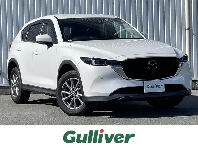 マツダ ＣＸ－５ XD スマートエディション 福岡県 2022(令4)年 2.3万km スノーフレイクホワイトパールマイカ ディーゼルターボ/純正ナビ/(フルセグTV/Bluetooth/USB)/バックカメラ/全方位カメラ/ヘッドアップディスプレイ/i-ACTIVESENSE/・ドライバーアテンションアラート/・速度標識認識/・車間認認知支援システム/・車線逸脱警報システム/・ブラインドスポットモニタリング/・スマートシティブレーキサポート/コーナーセンサー/ETC/ドライブレコーダー/禁煙車/LEDヘッドライト/オートライト/フォグランプ/横滑り防止装置/スマートキー/プッシュスタート/アイドリングストップ/ステアリングスイッチ/革巻きステアリング/ウィンカーミラー/電動格納ミラー/純正17インチアルミホイール/フロアマット