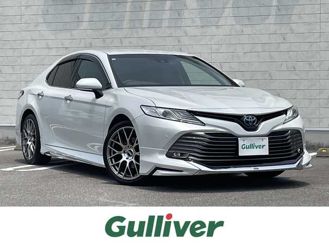 トヨタ カムリ G 宮崎県 2020(令2)年 6.1万km プラチナホワイトパールマイカ 純正ディスプレイオーディオ/フルセグTV/TVキャンセラー/バックカメラ/ステアリングスイッチ/レーダークルーズコントロール/横滑り防止機能/オートハイビーム/D席パワーシート/前後ドライブレコーダー/クリアランスソナー/ブラインドスポットモニタ/車線逸脱警報/モデリスタフルエアロ/ビルトインETC