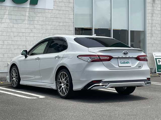 トヨタ カムリ G 宮崎県 2020(令2)年 6.1万km プラチナホワイトパールマイカ 純正ディスプレイオーディオ/フルセグTV/TVキャンセラー/バックカメラ/ステアリングスイッチ/レーダークルーズコントロール/横滑り防止機能/オートハイビーム/D席パワーシート/前後ドライブレコーダー/クリアランスソナー/ブラインドスポットモニタ/車線逸脱警報/モデリスタフルエアロ/ビルトインETC