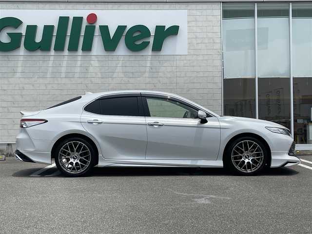 トヨタ カムリ G 宮崎県 2020(令2)年 6.1万km プラチナホワイトパールマイカ 純正ディスプレイオーディオ/フルセグTV/TVキャンセラー/バックカメラ/ステアリングスイッチ/レーダークルーズコントロール/横滑り防止機能/オートハイビーム/D席パワーシート/前後ドライブレコーダー/クリアランスソナー/ブラインドスポットモニタ/車線逸脱警報/モデリスタフルエアロ/ビルトインETC