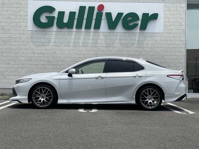 トヨタ カムリ G 宮崎県 2020(令2)年 6.1万km プラチナホワイトパールマイカ 純正ディスプレイオーディオ/フルセグTV/TVキャンセラー/バックカメラ/ステアリングスイッチ/レーダークルーズコントロール/横滑り防止機能/オートハイビーム/D席パワーシート/前後ドライブレコーダー/クリアランスソナー/ブラインドスポットモニタ/車線逸脱警報/モデリスタフルエアロ/ビルトインETC