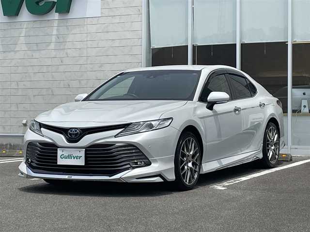 トヨタ カムリ G 宮崎県 2020(令2)年 6.1万km プラチナホワイトパールマイカ 純正ディスプレイオーディオ/フルセグTV/TVキャンセラー/バックカメラ/ステアリングスイッチ/レーダークルーズコントロール/横滑り防止機能/オートハイビーム/D席パワーシート/前後ドライブレコーダー/クリアランスソナー/ブラインドスポットモニタ/車線逸脱警報/モデリスタフルエアロ/ビルトインETC