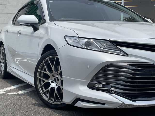 トヨタ カムリ G 宮崎県 2020(令2)年 6.1万km プラチナホワイトパールマイカ 純正ディスプレイオーディオ/フルセグTV/TVキャンセラー/バックカメラ/ステアリングスイッチ/レーダークルーズコントロール/横滑り防止機能/オートハイビーム/D席パワーシート/前後ドライブレコーダー/クリアランスソナー/ブラインドスポットモニタ/車線逸脱警報/モデリスタフルエアロ/ビルトインETC