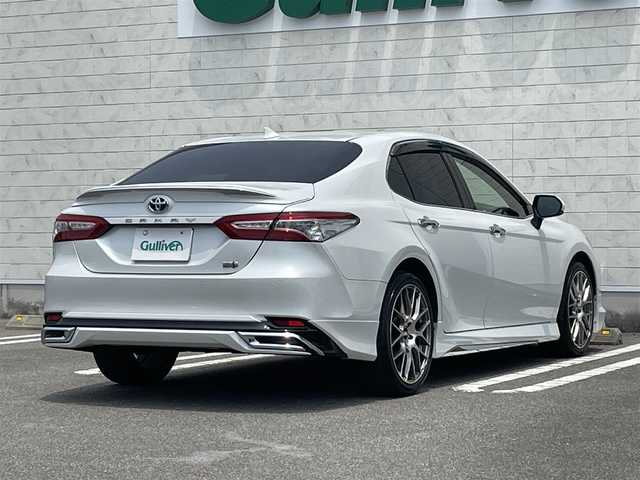 トヨタ カムリ G 宮崎県 2020(令2)年 6.1万km プラチナホワイトパールマイカ 純正ディスプレイオーディオ/フルセグTV/TVキャンセラー/バックカメラ/ステアリングスイッチ/レーダークルーズコントロール/横滑り防止機能/オートハイビーム/D席パワーシート/前後ドライブレコーダー/クリアランスソナー/ブラインドスポットモニタ/車線逸脱警報/モデリスタフルエアロ/ビルトインETC