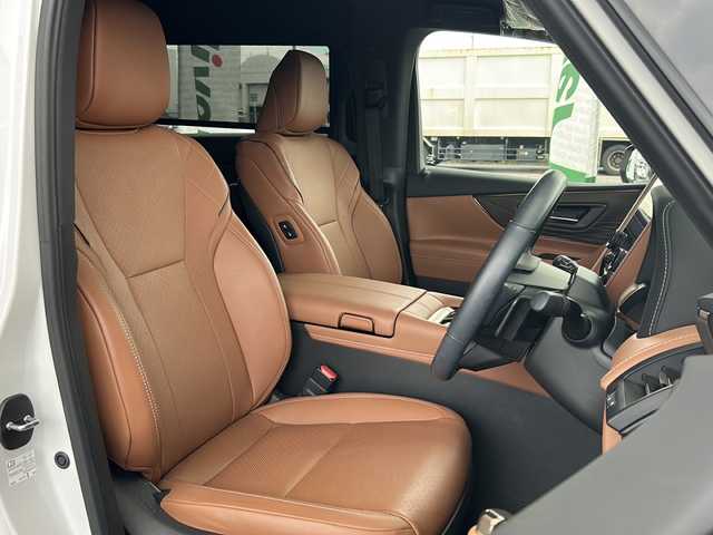 トヨタ ヴェルファイア Z プレミア 愛知県 2023(令5)年 0.9万km プラチナホワイトパールマイカ ワンオーナー/禁煙車/左右独立ムーンルーフ/純正メーカーナビ/【フルセグTV/Bluetooth】/パノラミックビューモニター/デジタルインナーミラー/両側パワースライドドア/レーダークルーズコントロール/衝突被害軽減システム/ブラインドスポットモニター/パーキングサポートブレーキ/リアカメラディテクション安心降車アシスト/クリアランスソナー/レーンキープアシスト/レーンチェンジアシスト/ロードサインアシスト/プロアクティブドライビングアシスト/フロントクロストラフィックアラート/リアクロストラフィックアラート/後方車両接近装置/純正19インチAW/オートライト/LEDヘッドライト/茶レザーシート/パワーシート（メモリ付き）/シートヒーター/エアシート/後部座席オットマン/キャプテンシート/ETC2.0/スペアキー１/保証書/取扱説明書/記録簿R６