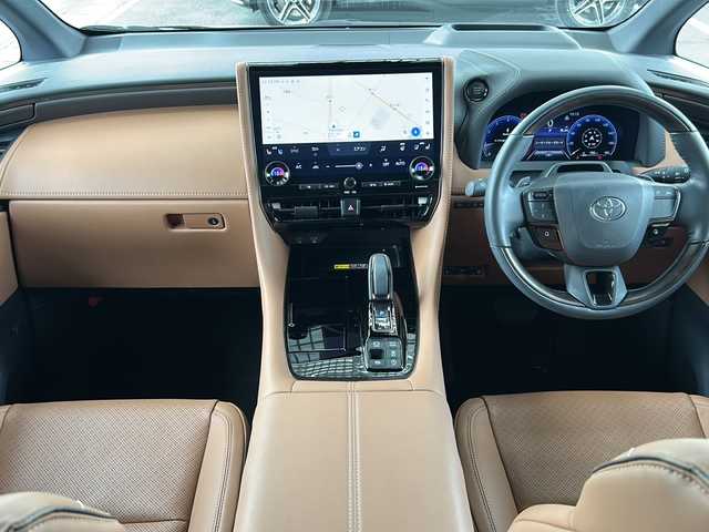 トヨタ ヴェルファイア Z プレミア 愛知県 2023(令5)年 0.9万km プラチナホワイトパールマイカ ワンオーナー/禁煙車/左右独立ムーンルーフ/純正メーカーナビ/【フルセグTV/Bluetooth】/パノラミックビューモニター/デジタルインナーミラー/両側パワースライドドア/レーダークルーズコントロール/衝突被害軽減システム/ブラインドスポットモニター/パーキングサポートブレーキ/リアカメラディテクション安心降車アシスト/クリアランスソナー/レーンキープアシスト/レーンチェンジアシスト/ロードサインアシスト/プロアクティブドライビングアシスト/フロントクロストラフィックアラート/リアクロストラフィックアラート/後方車両接近装置/純正19インチAW/オートライト/LEDヘッドライト/茶レザーシート/パワーシート（メモリ付き）/シートヒーター/エアシート/後部座席オットマン/キャプテンシート/ETC2.0/スペアキー１/保証書/取扱説明書/記録簿R６