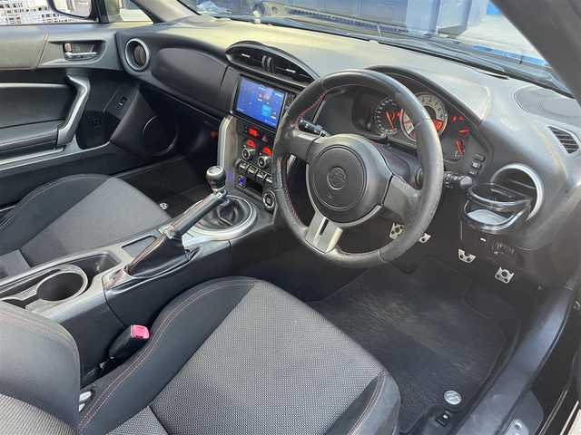 トヨタ ８６ GT 愛知県 2014(平26)年 10.7万km クリスタルブラックシリカ (株)IDOMが運営する【じしゃロン名古屋鳴海店】の自社ローン専用車両になりますこちらは現金またはオートローンご利用時の価格です。自社ローンご希望の方は別途その旨お申付け下さい/社外7インチナビ/【Bluetooth/CD/DVD/フルセグTV/USB】/HIDヘッドライト/オートライト/オートマチックハイビーム/ABS/横滑り防止装置/カーテンエアバッグ/プッシュスタート/スマートキー/社外17インチAW