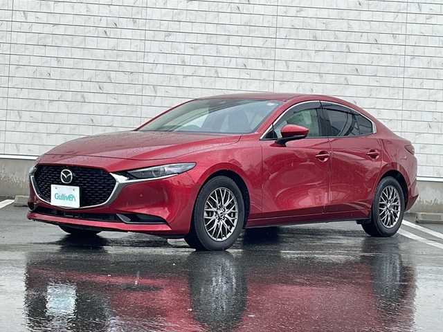 マツダ マツダ３セダン 20S Lパッケージ 山形県 2020(令2)年 5万km ソウルレッドクリスタルM i-ACTIVSENSE/・アドバンスト・スマート・シティ・ブレーキ・サポート/・AT誤発進抑制制御/・レーンキープ・アシスト・システム/・ブラインドスポットモニタリング/純正メモリナビ/（DVD/フルセグ/BT/HDMI/USB）/360°カメラ/純正ドライブレコーダー前後/ビルトインETC/パドルシフト/レーダークルーズコントロール/前後コーナーセンサー/レザーシート/シートヒーター/パワーシート/LEDヘッドライト/フォグランプ/純正フロアマット/スペアキー×1/プッシュスタート