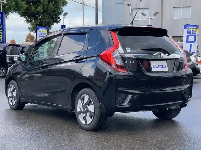 ホンダ フィット ハイブリット Fパッケージ 福井県 2014(平26)年 6.3万km クリスタルブラックパール (株)IDOMが運営する【じしゃロン福井店】の自社ローン専用車両になりますこちらは現金またはオートローンご利用時の価格です。自社ローンご希望の方は別途その旨お申付け下さい/登録時走行距離62738km/ワンオーナー/社外ナビ/地デジTV(AM/FM/CD/USB)/バックカメラ/ビルトインETC/ドライブレコーダー/横滑り抑制機能/車両接近通報装置/ECONモード/アイドリングストップ/純正フロアマット/プッシュスタート/スマートキー(スペアキー×1)/保証書/取説