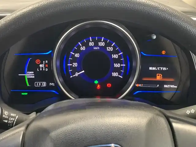 ホンダ フィット ハイブリット Fパッケージ 福井県 2014(平26)年 6.3万km クリスタルブラックパール (株)IDOMが運営する【じしゃロン福井店】の自社ローン専用車両になりますこちらは現金またはオートローンご利用時の価格です。自社ローンご希望の方は別途その旨お申付け下さい/登録時走行距離62738km/ワンオーナー/社外ナビ/地デジTV(AM/FM/CD/USB)/バックカメラ/ビルトインETC/ドライブレコーダー/横滑り抑制機能/車両接近通報装置/ECONモード/アイドリングストップ/純正フロアマット/プッシュスタート/スマートキー(スペアキー×1)/保証書/取説