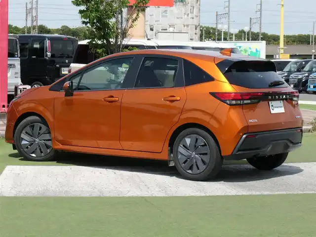 日産 ノート X 千葉県 2021(令3)年 2.3万km プレミアムコロナオレンジ エマージェンシーブレーキ/純正メモリーナビ/地デジTV/【DVD/CD再生機能　Bluetooth接続】/バックカメラ/ドライブレコーダー（DH5-D）/ステアリングスイッチ/ETC/LEDヘッドライト/フォグライト/ウインカーミラー/コーナーセンサー/インテリジェントキー