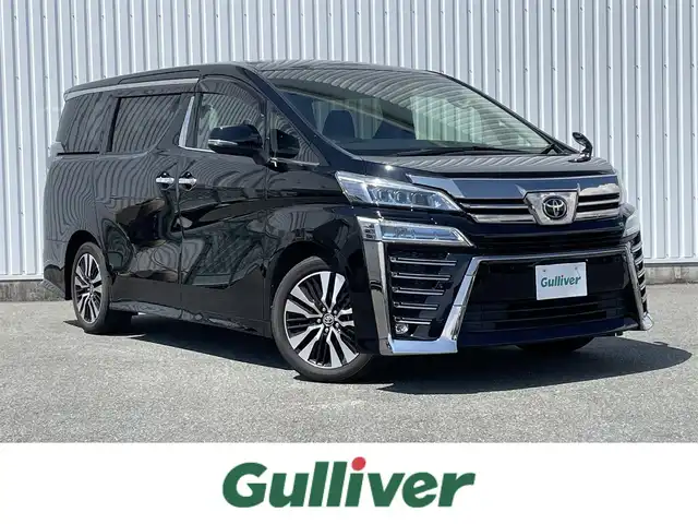トヨタ ヴェルファイア Z Gエディション 福岡県 2020(令2)年 3.3万km ブラック フリップダウンモニター/トヨタセーフティセンス/PCS/LTA/PKSB/クリアランスソナー/純正９インチＤＡナビ/フルセグTV/CD/DVD/BT/AM/FM/applecarplay/androidauto/Miracast/バックカメラ/パワーバックドア/両側パワースライドドア/シートメモリー/前席パワーシート/前席シートヒーター＆ベンチレーション/三眼LED/オートハイビーム/フォグランプ/オットマン/ビルトインETC/スマートキー/プッシュスタート/電動パーキング/ブレーキホールド