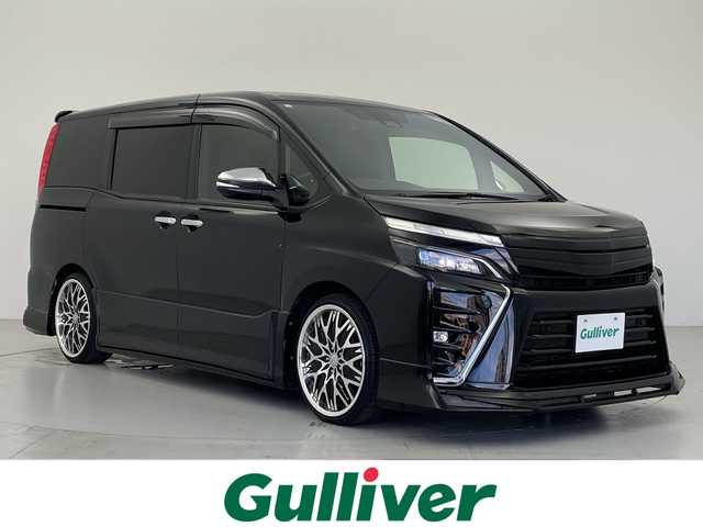 トヨタ ヴォクシー ZS 煌Ⅱ 愛知県 2020(令2)年 2.3万km ブラック アルパインBIGX11インチナビ/・フルセグ/・CD/DVD/・Bluetooth/・AUX/アルパイン12.8インチフリップダウンモニター/バックカメラ/デジタルインナーミラー/ETC/社外ドライブレコーダー/両側パワースライドドア/プリクラッシュセーフティ/パーキングサポートブレーキ/レーンディパーチャーアラート/クルーズコントロール/横滑り防止/オートマチックハイビーム/フォグランプ/アドミレーションエアロ＆マフラー/純正ドアミラー＋社外シーケンシャルウィンカーレンズ/社外テールランプシーケンシャルウインカー/プッシュスタート