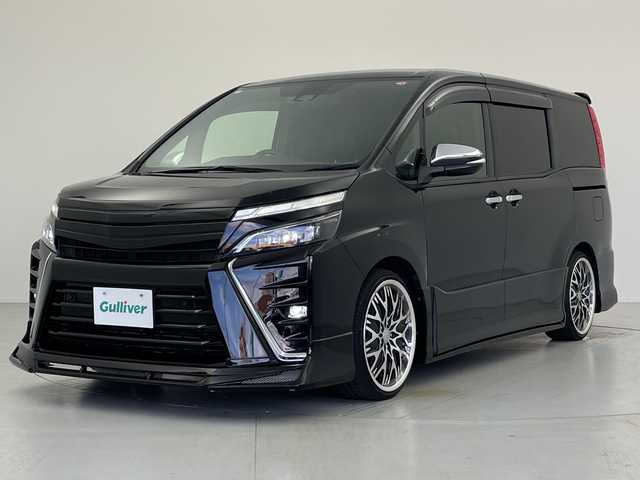 トヨタ ヴォクシー ZS 煌Ⅱ 愛知県 2020(令2)年 2.3万km ブラック アルパインBIGX11インチナビ/・フルセグ/・CD/DVD/・Bluetooth/・AUX/アルパイン12.8インチフリップダウンモニター/バックカメラ/デジタルインナーミラー/ETC/社外ドライブレコーダー/両側パワースライドドア/プリクラッシュセーフティ/パーキングサポートブレーキ/レーンディパーチャーアラート/クルーズコントロール/横滑り防止/オートマチックハイビーム/フォグランプ/アドミレーションエアロ＆マフラー/純正ドアミラー＋社外シーケンシャルウィンカーレンズ/社外テールランプシーケンシャルウインカー/プッシュスタート