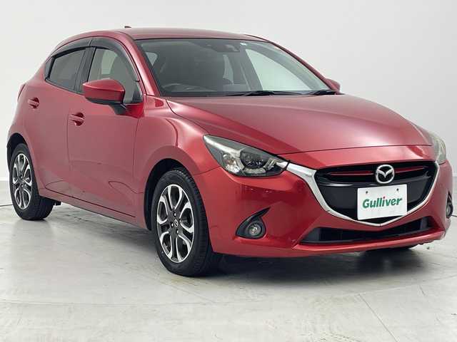 マツダ デミオ XD ツーリング 茨城県 2016(平28)年 8.6万km ソウルレッドプレミアムメタリック ターボ/HDDナビ/ワンセグテレビ/アイドリングストップ/クルーズコントロール/ドアバイザー/プッシュスタート/純正フロアマット/Bluetooth/運転助手席シートヒーター/スペアキー1個