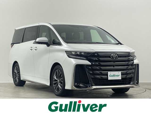 トヨタ ヴェルファイア ハイブリット Z プレミア 埼玉県 2023(令5)年 1.1万km プラチナホワイトパールマイカ サンルーフ/純正１４型ディスプレイオーディオ/ユニバーサルステップ/ベージュレザーシート/ワイヤレス充電/フルセグTV/360°カメラ/ブラインドスポットモニター/ヘッドアップディスプレイ/ＬＥＤヘッドライト/ビルトインＥＴＣ２．０/両側パワースライドドア/トヨタセーフティセンス/デジタルインナーミラー/シートヒーター・エアシート(D・N・2nd)/3列シート・オットマン・フルフラットシート/ウォークスルー/パワーシート/パワーバックドア/Bluetooth・HDMI/純正19インチアルミホイール/100V電源・1500W電源/MTモード付AT/Wエアコン/ステアリングヒーター/衝突被害軽減/スマートキー・プッシュスタート/パーキングアシスト/アイドリングストップ