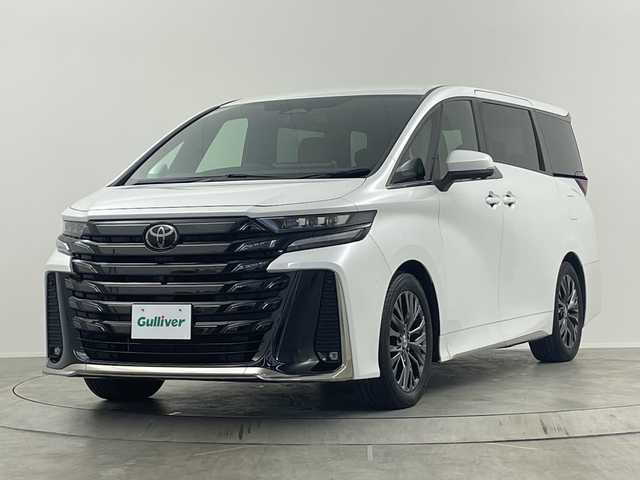 トヨタ ヴェルファイア ハイブリット Z プレミア 埼玉県 2023(令5)年 1.1万km プラチナホワイトパールマイカ サンルーフ/純正１４型ディスプレイオーディオ/ユニバーサルステップ/ベージュレザーシート/ワイヤレス充電/フルセグTV/360°カメラ/ブラインドスポットモニター/ヘッドアップディスプレイ/ＬＥＤヘッドライト/ビルトインＥＴＣ２．０/両側パワースライドドア/トヨタセーフティセンス/デジタルインナーミラー/シートヒーター・エアシート(D・N・2nd)/3列シート・オットマン・フルフラットシート/ウォークスルー/パワーシート/パワーバックドア/Bluetooth・HDMI/純正19インチアルミホイール/100V電源・1500W電源/MTモード付AT/Wエアコン/ステアリングヒーター/衝突被害軽減/スマートキー・プッシュスタート/パーキングアシスト/アイドリングストップ