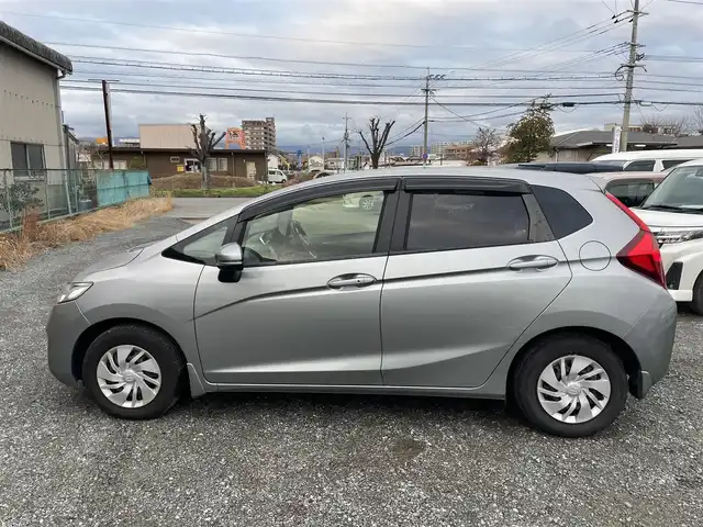 ホンダ フィット 13G Lパッケージ 福岡県 2016(平28)年 4万km ティンテッドシルバーM 純正ナビ　DVD　フルセグ　BT　MSV/バックカメラ/ABS/キセノン/W　サイド　カーテンエアバッグ/クルコン/ドラレコ/スマートキー