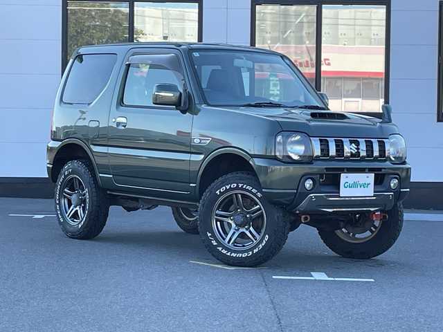 スズキ ジムニー ランドベンチャー 山口県 2016(平28)年 5.9万km クールカーキPM 4WD/5速マニュアル/pioneer製SDナビ/　Bluetooth/　AM/FM/　ワンセグテレビ/　DVD/　HDMI/ETC/前後ドライブレコーダー/リモコンキー/スペアキー/ステアリングスイッチ/リフトアップ/インタークーラー付ターボチャージャー/ABS/シートヒーター/純正フロアマット/背面タイヤ/本革巻ステアリング/ドアバイザー/純正16インチアルミホイール/ウィンカーミラー/衝突安全ボディー/運転席/助手席エアバッグ/パワーウィンドウ/パワーステアリング
