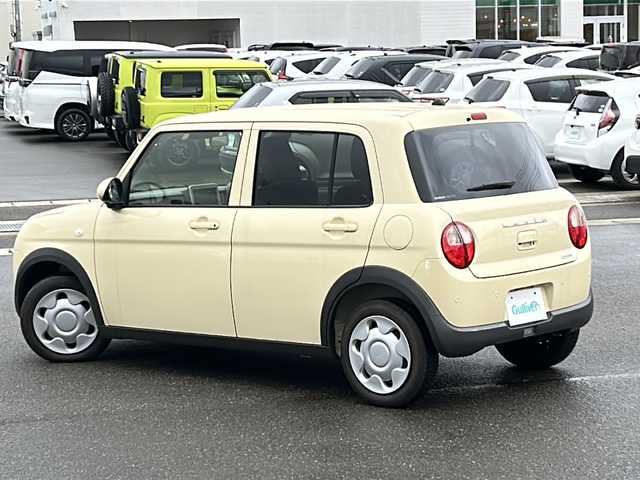 スズキ ラパン L 秋田県 2022(令4)年 0.9万km シフォンアイボリーM 登録時走行距離8674km/４WD/後方コーナーセンサー/横滑り防止装置/盗難防止装置/レーンキープアシスト/衝突被害軽減システム/車線逸脱警報/アイドリングストップ/オートライト/純正フロアマット/運転席シートヒーター/格納サイドミラー/スマートキー