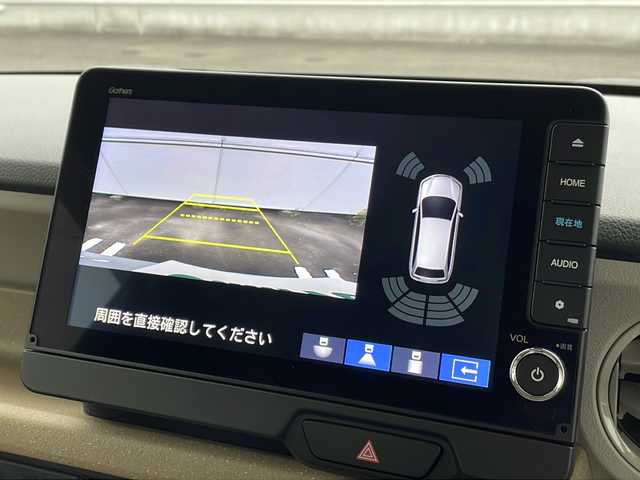 ホンダ Ｎ ＢＯＸ 岐阜県 2023(令5)年 2.3万km プレミアムサンライトホワイトパール ホンダセンシング/レーンキープ/ステアリングアシスト/アダプティブクルーズコントロール/先行車発信お知らせ/歩行者事故低減ステアリング/標識認識機能/誤発進抑制機能/後方誤発進抑制機能/近距離衝突軽減ブレーキ/急アクセル抑制機能/パーキングセンサーシステム/９インチコネクトナビ/DVD/Bluetooth/フルセグTV/バックカメラ/両側パワースライドドア/LEDオートライト/オートハイビーム/前席シートヒーター/リアサンシェード/電子パーキング/シートバックテーブル/リアシート左右独立センターアーム/保証書/取扱説明書/スペアキー