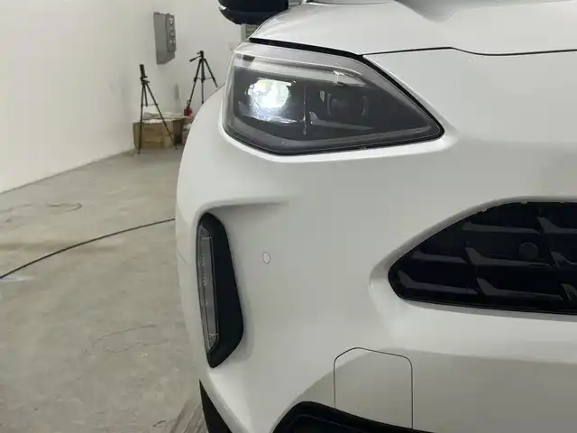 トヨタ ヤリスクロス ハイブリッド Z 岡山県 2024(令6)年 0.7万km ブラックマイカ/プラチナホワイトパールマイカ 純正８インチディスプレイオーディオ/【ナビ/Bluetooth/フルセグTV/Carplay】/パノラミックビューモニター/ハーフレザーシート/前席シートヒーター/ステアリングヒーター/レーダークルーズコントロール/社外ドライブレコーダー（前後）/型番:TZ-DR210/ビルトインＥＴＣ/プリクラッシュセーフティ/HDMI接続/オートブレーキホールド/ＬＥＤヘッドライト/オートハイビーム/ブラインドスポットモニター/テレビキャンセラー/スマートキー×1