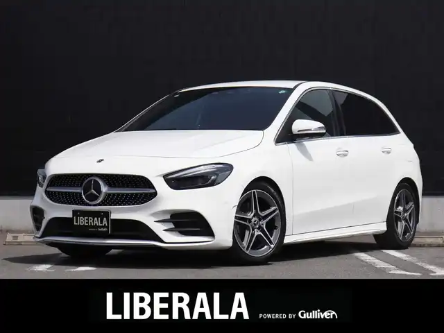 メルセデス・ベンツ Ｂ１８０ AMGライン 静岡県 2019(令1)年 4.8万km ポーラホワイト AMGライン/純正HDDナビ/（フルセグTV/Bluetooth/USB）/バックカメラ/ETC2.0/前方ドライブレコーダー/ハーフレザーシート/前席パワーシート/前席シートヒーター/パドルシフト/レーダーセーフティーパッケージ/・アクティブディスタンスアシストディストロニック(全自動再発進機能付)/・アクティブステアリングアシスト/・アクティブレーンチェンジングアシスト/・アクティブエマージェンシーストップアシスト/・アクティブブレーキアシスト(歩行者/飛び出し検知機能付)/・PRE-SAFEインパルス(前面衝突被害軽減機能)/・アクティブブラインドスポットアシスト/・アクティブレーンキーピングアシスト/・リアCPA(被害軽減ブレーキ付後方衝突警告システム)/・トラフィックサインアシスト/純正18インチアルミホイール/スマートキー/純正LEDヘッドライト/スペアキー1本/保証書/取扱説明書