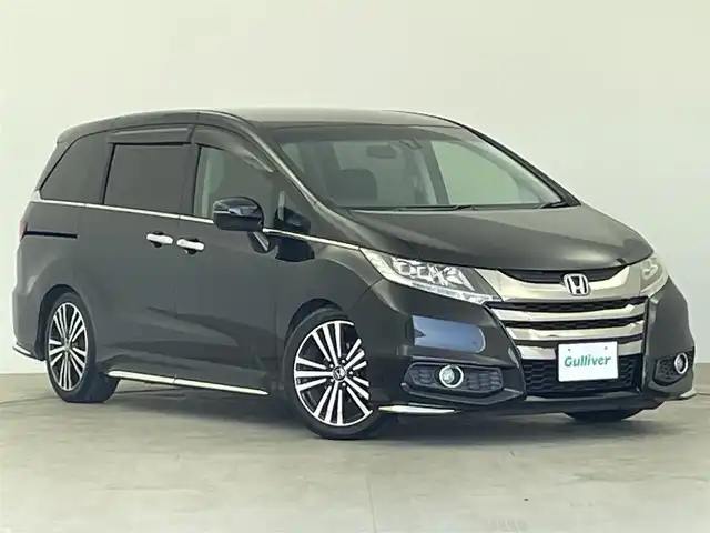 ホンダ オデッセイ アブソルート 大分県 2014(平26)年 9.5万km 黒 純正ディーラーナビ/・フルセグTV/・Bluetooth/・CD/・DVD/バックカメラ/両側パワースライドドア/ビルトインETC/フリップダウンモニター/クルーズコントロール/純正16インチアルミホイール/フォグライト/ステアリングリモコン/ハーフレザーシート/パドルシフト/LEDヘッドライト/プッシュスタート/スマートキー/電動格納ミラー/パワーウィンドウ/パワーステアリング
